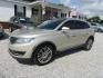 2017 Gold /Tan Lincoln MKX Reserve (2LMPJ6LR8HB) with an 3.7L V6 DOHC 24V engine, Automatic transmission, located at 15016 S Hwy 231, Midland City, AL, 36350, (334) 983-3001, 31.306210, -85.495277 - Photo#2